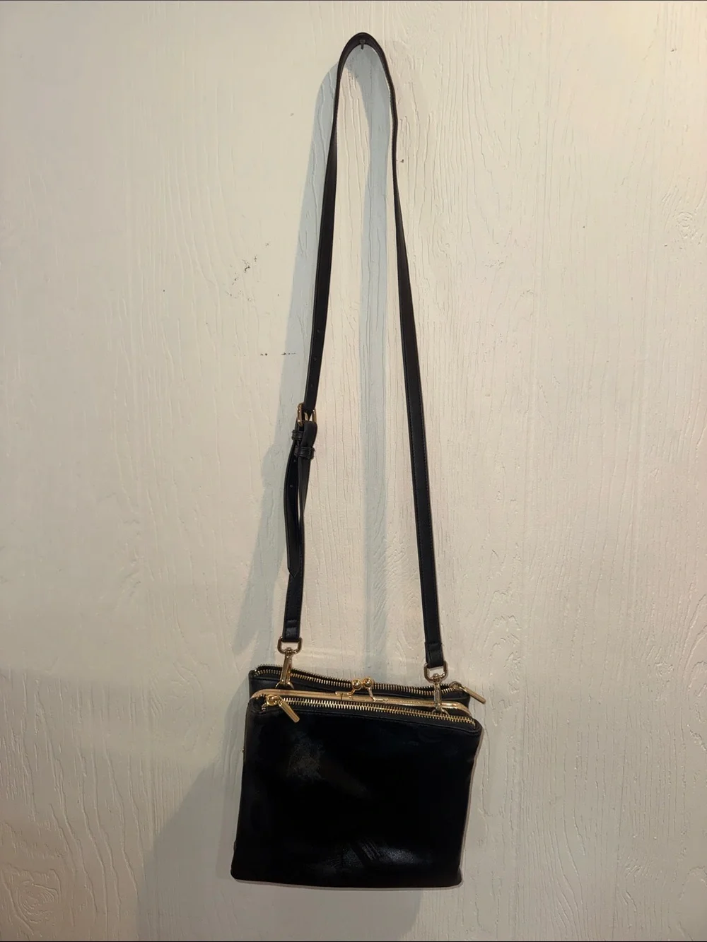 Classic Black Leather Crossbody Bag with Gold Hardware